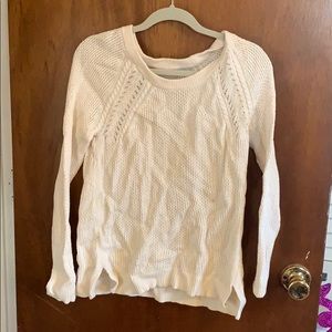 Long sleeved sweater.